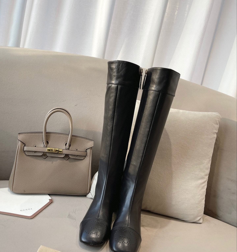 G*u*i boots
